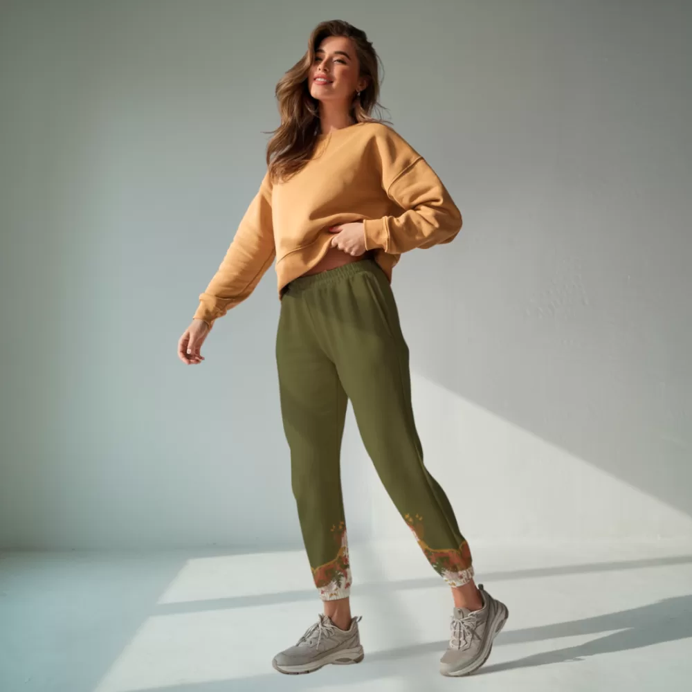 A model wearing green joggers.